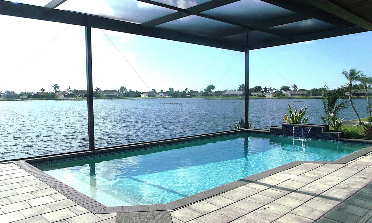 Pelican House | 80-Ft Waterfront Resort-Like Retreat, Relax Heated Pool Jacuzzi Bikes Pier
