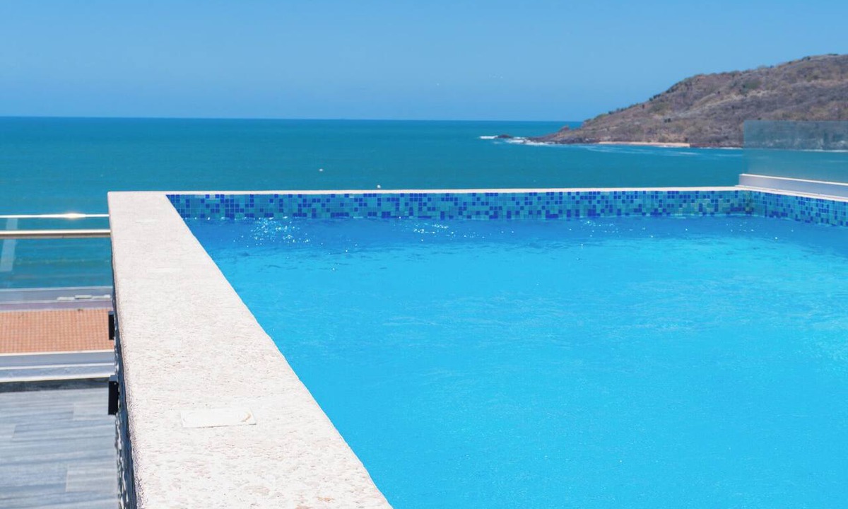 Zona Dorada Apartment | Apartment in Zona Dorada, 6 minutes from the beach, with a rooftop pool and barbecue area