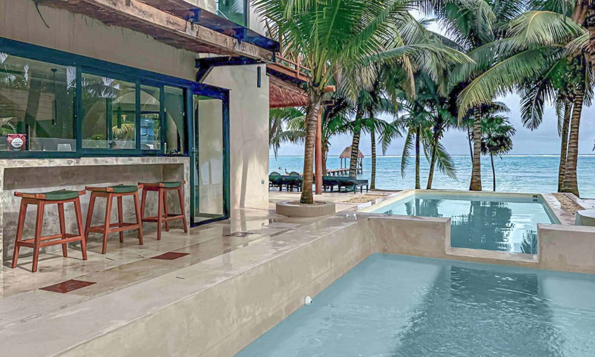 Soliman Bay House | Beachfront home with private heated pool, jacuzzi, sauna, ocean views & AC