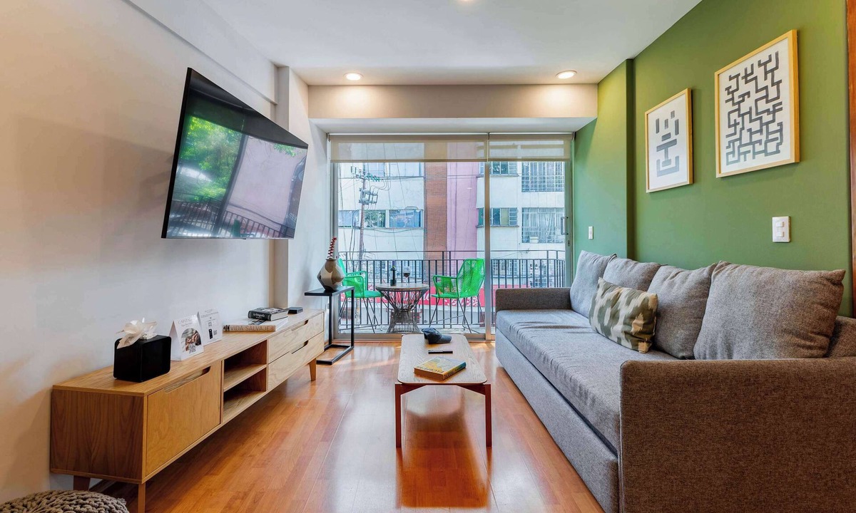 Anahuac Condo | Capitalia | Bright balcony + Bike & Leafy Views