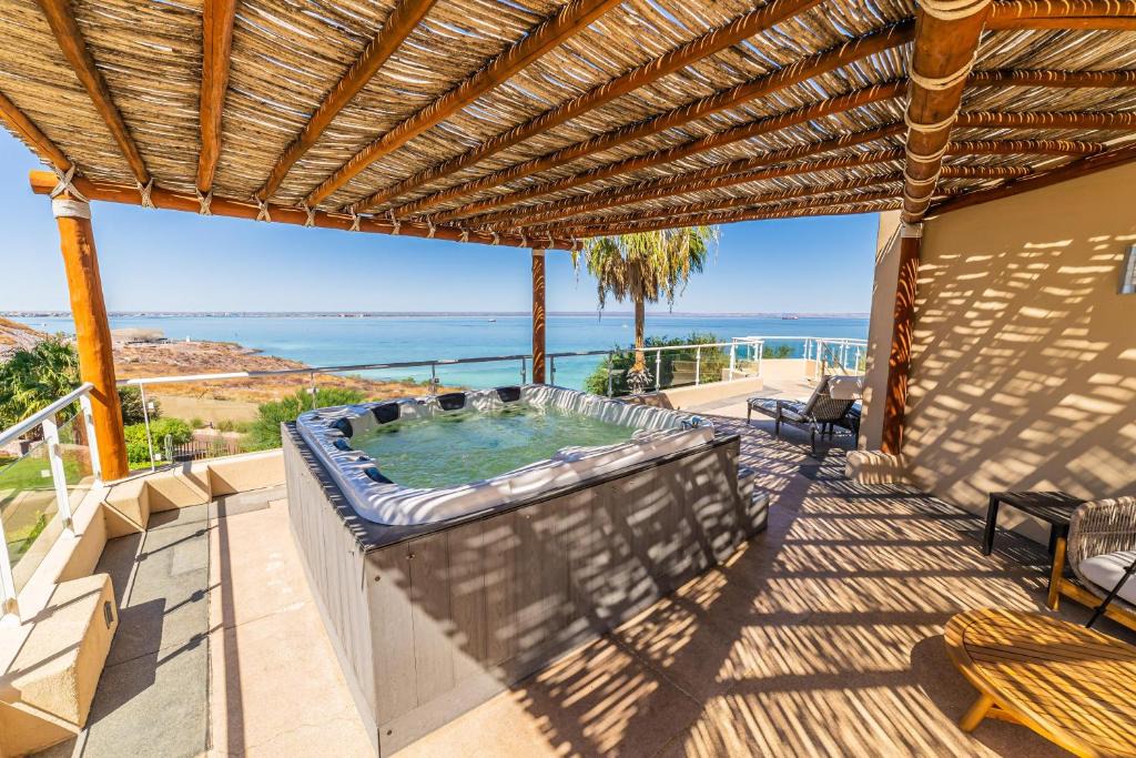 La Paz Villa | Luxury Oceanfront Villa 7 at Puerta Cortes Resort with Jacuzzi & Golf Cart