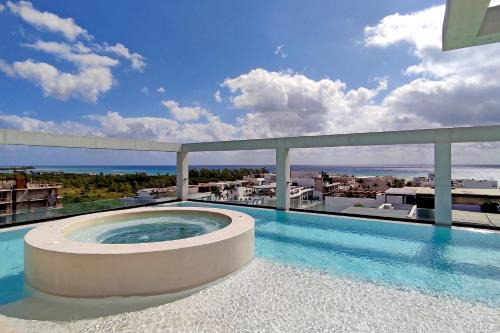 Zazil-ha Apartment | Modern 2 Story Beach Loft with Rooftop Pool and Ocean Views