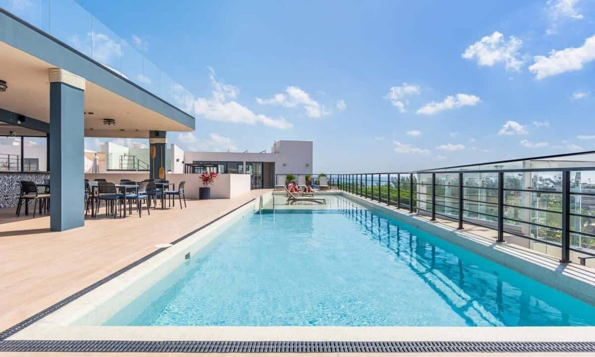 Zazil-ha Condo | Rooftop Pool and Ocean Views in Modern Studio Near Beach
