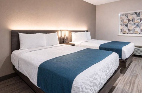 Mesquite Hotel | 2 Accommodations | 4.9 Mi from Trinity Forest Adventure Park | Pets Allowed