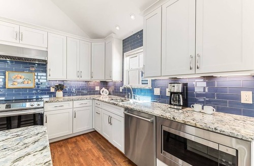 Butler Beach House | 2 Min. Walk to Beach/Ocean Views/Hot Tub/Game Room/Bikes/In-Law Suite