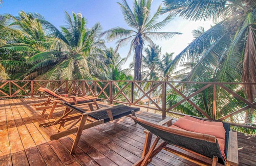 Soliman Bay House | Beachfront home with private heated pool, jacuzzi, sauna, ocean views & AC