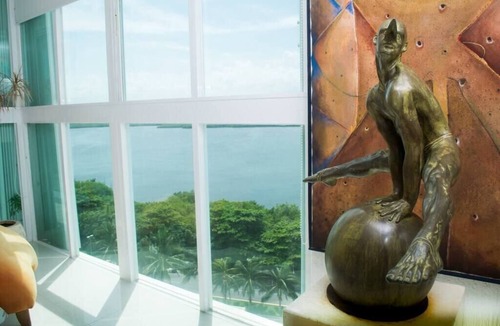 Zona Hotelera Condo | breathtaking studio, w/ocean and lagoon views, amazing wrap around balcony,.