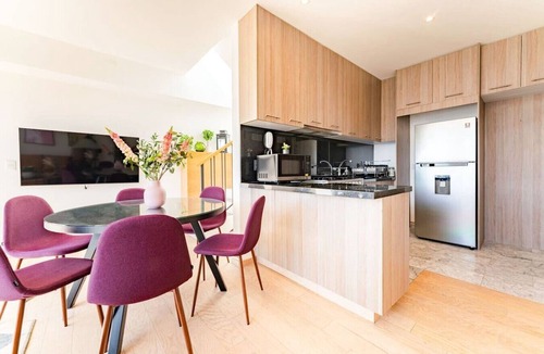 Roma Sur Condo | City Views & Private Terrace in Trendy Roma