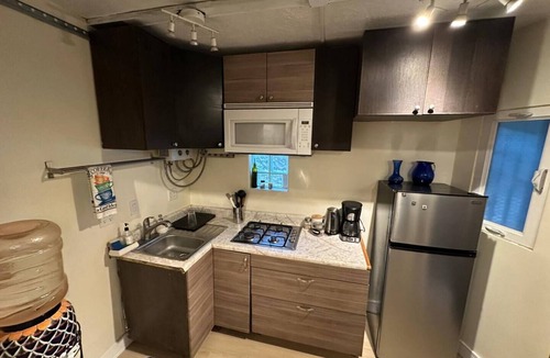 San Antonio del Mar Apartment | Cozy studio 3 blocks from the beach in San Antonio del Mar. Enjoy a private rooftop terrace with our signature galactic whale mural, community pools & tennis courts, and a secure 24/7 gated community. Perfect for couples or small groups.