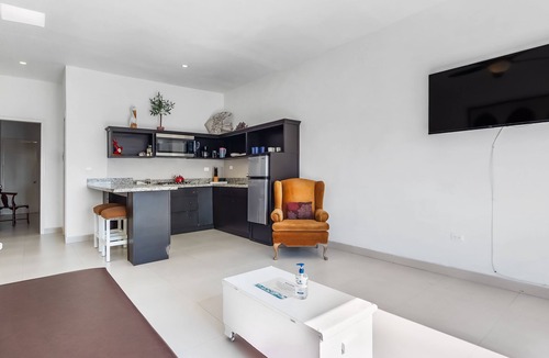 La Paloma Apartment | Dog-friendly suite with beach views, outdoor pool, patio, kitchenette, & AC