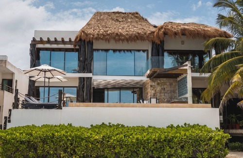 Miramar House | Exclusive 4-bedroom beach house with private access and ocean views.