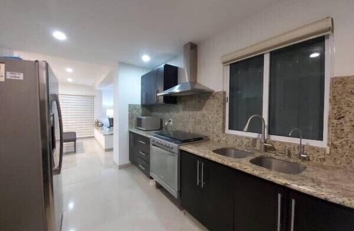 Libertad Condo | Exclusive condo with unforgettable sunsets and ocean views 6 minutes from beach.