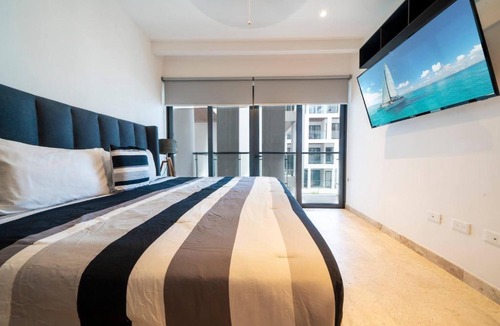Tohoku House | Ipana 212 - 2BR in Heart of PDC with Pools & Gym