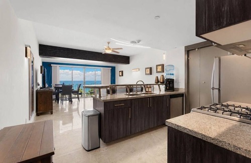 Downtown Cabo San Lucas Condo | "La Vista" offers a stylish 2BD/2BA retreat with a rooftop pool & workspace.