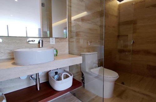 Zazil-ha Apartment | Modern 2 Story Beach Loft with Rooftop Pool and Ocean Views