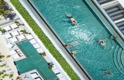 Puerto Juarez Condo | Mousai Studio-Indulge in modern adults-only elegance at the exclusive Cancun.