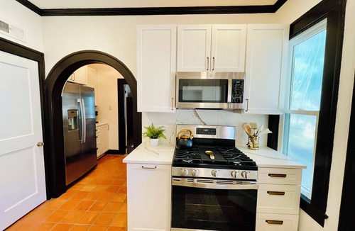 Sayles Blvd. Area House | Old-World Charm in Historic Sayles Blvd Area, Spanish Revival Home, Sleeps 8!