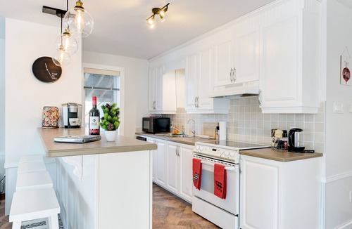 Saint-Andre-d'Argenteuil House | Riverwood Cottage - Your Cozy Riverside Escape w/SPA, Pool Table & Dock Access