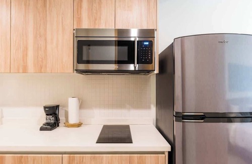 Zazil-ha Condo | Rooftop Pool and Ocean Views in Modern Studio Near Beach