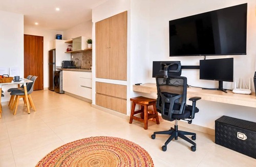 Luis Donaldo Colosio Apartment | Stunning Rooftop Ocean View Studio · Blanko Living