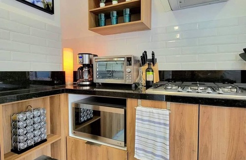 North Hotel Zone Condo | Stunning rooftop infinity pool minutes from the beach