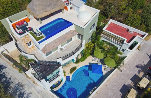 Isla Mujeres House | Stunning Views - Popular luxury home, 4 king suites, TWO pools and Ocean Access!