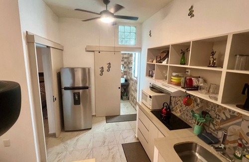Puerto Juarez Apartment | SWEET HOME steps from the beach & ferry to Isla Mujeres. With Pool & rooftop