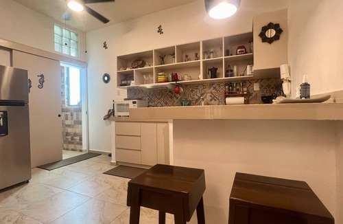 Puerto Juarez Apartment | SWEET HOME steps from the beach & ferry to Isla Mujeres. With Pool & rooftop
