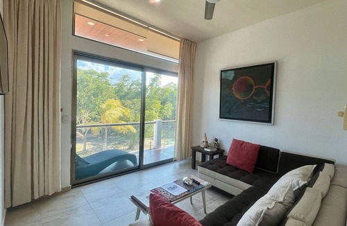Puerto Juarez Apartment | SWEET HOME steps from the beach & ferry to Isla Mujeres. With Pool & rooftop