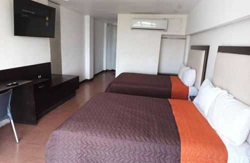 Mazatlan Hotel | Two Rooms, Four Beds: Perfect Setup for Friends, Family, or Group Adventures