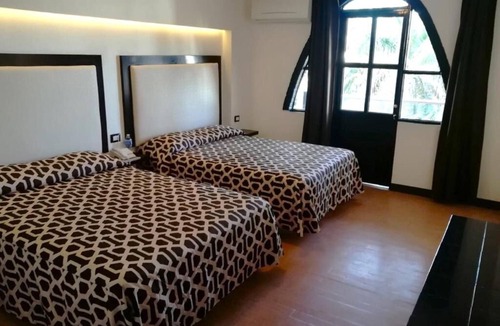 Mazatlan Hotel | Two Rooms, Four Beds: Perfect Setup for Friends, Family, or Group Adventures