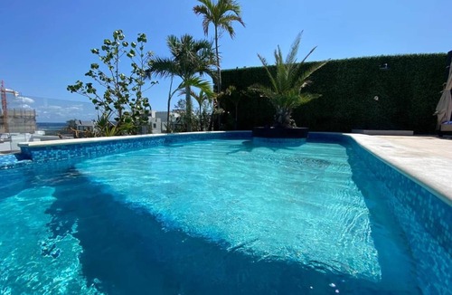 Zazil-ha Apartment | Urban Suites Infinity Pool with ocean views