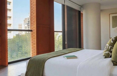 Zona Minerva Apartment | Where Comfort Meets the Skyline