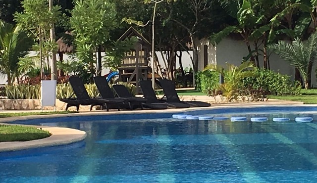 15 Minutes From Xcaret, Cenotes & the Beach-Gated Pool Condo + Fast Wifi + roof. in Industrial