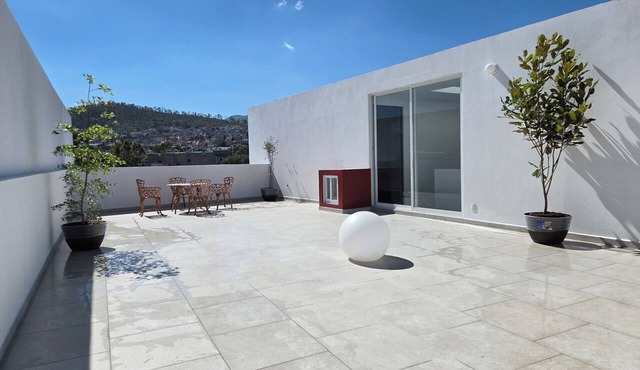 5-bedroom, 5-bathroom home with a rooftop garden offering panoramic views and a 2-car garage in Pachuca de Soto