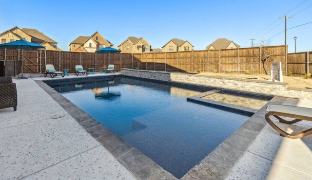 5 Bedroom Home + Pool + Media Room+ Grill! in Rockwall