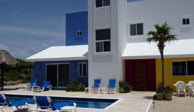 Architecturally Distinguished Colorful Casa on Water's Edge in Akumal