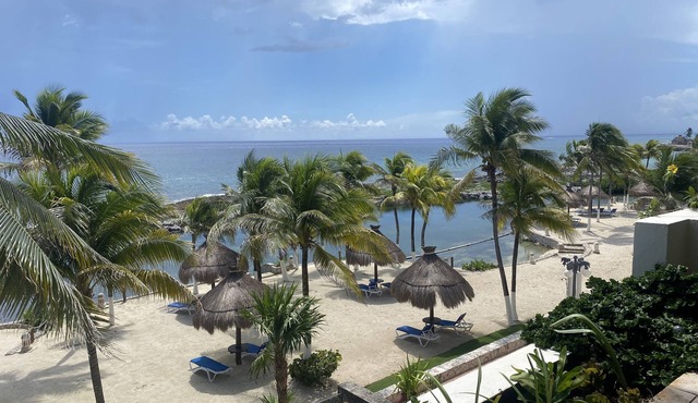 Breathtaking ocean view, open space condo with private beach in Riviera Maya in Puerto Aventuras