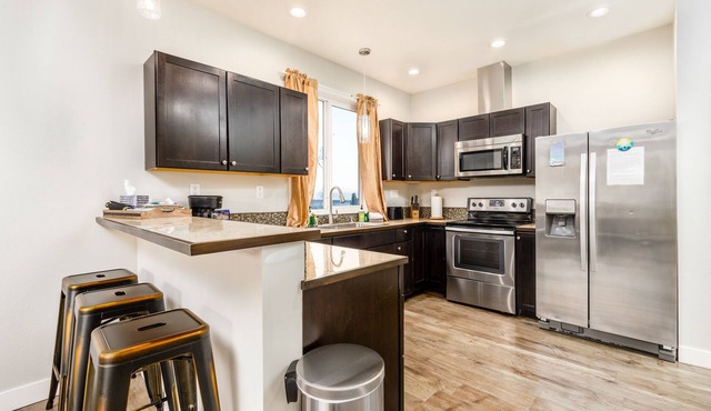 Centrally located, mountain-view retreat with private balcony, & washer/dryer in Eagle River