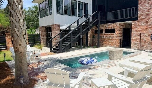 Coastal Luxury with Heated Pool, Putting Green & Game Room in Saint Simons Island