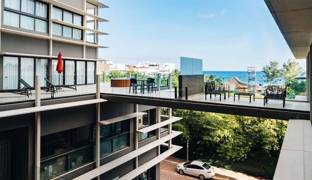 Dreams A203 · Moorea-Partial Ocean view w Roof Top Pools/Hot tub