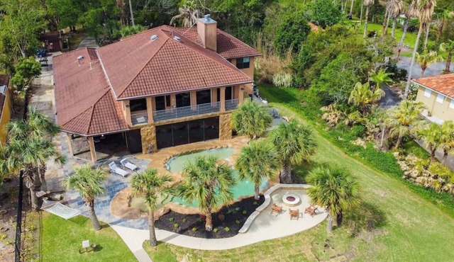 Luxury Waterfront Estate w/Heated Pools, Private Pier & Walk to Boardwalk in Kemah