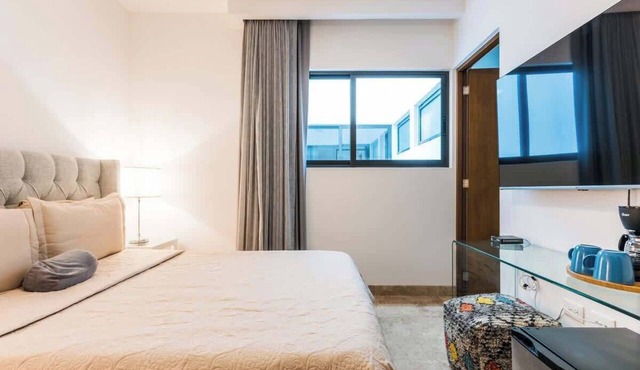 Modern Condo Steps to 5th Ave and Beach w Rooftop Pool in Playa del Carmen