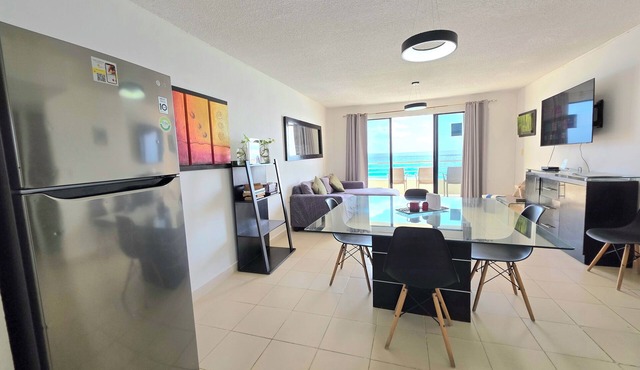 Oceanfront white sand beach condo in Cancun
