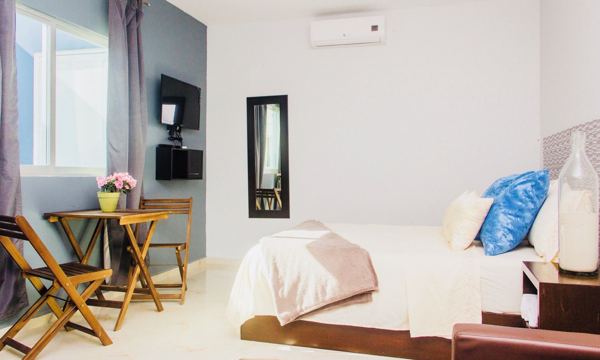 Luis Donaldo Colosio Condo | Room-condohotel 5th Avenue Deluxe Triple