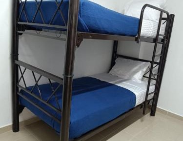 Single Bed in Dormitory Room