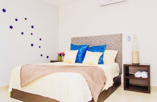 Luis Donaldo Colosio Condo | Room-condohotel 5th Avenue Deluxe Triple
