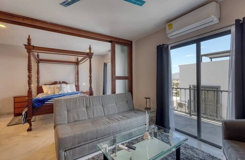 Downtown Cabo San Lucas Apartment | Dog-friendly Apartment With Rooftop Infinity Pool, Gym, Central AC & Balcony