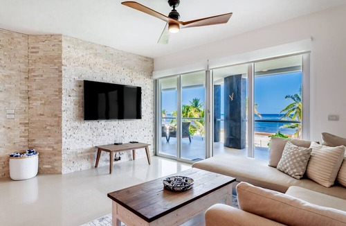 Puerto Juarez Condo | Gorgeous Ocean Front Apartment Casa Shell by RedAwning