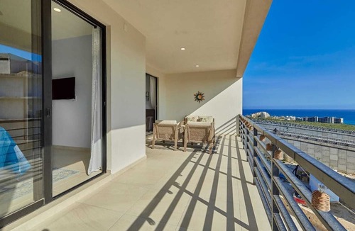 Cabo Bello Condo | New 2-bedroom, 2-bath condo at Vista Azul with Medano Beach and marina views. Enjoy a bright living space, spacious patio, shared BBQ and firepit, and a pool nearby. Just minutes from downtown—perfect for relaxing and exploring Cabo.